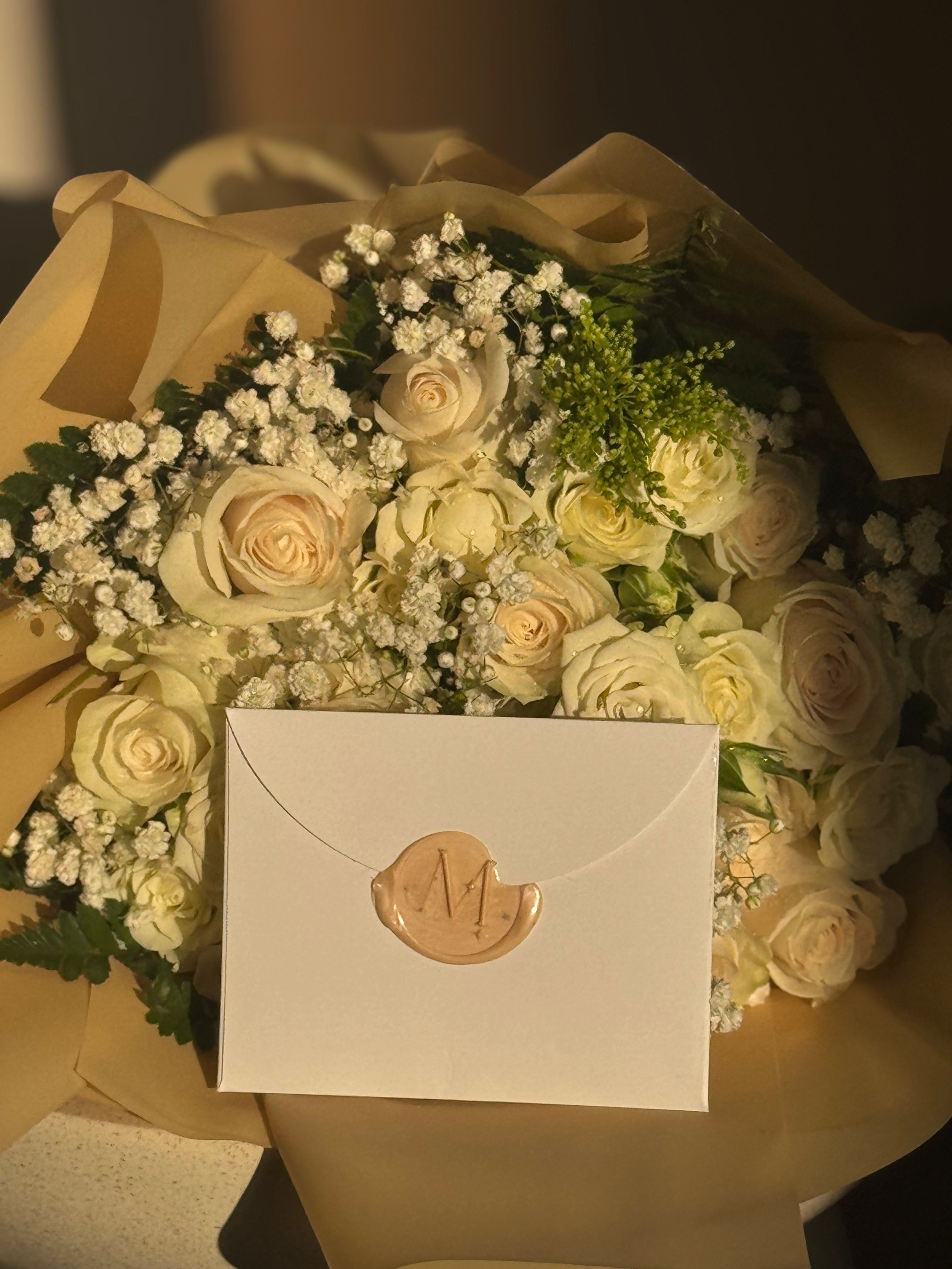 Gift wrapping and Elegant White Rose Bouquet