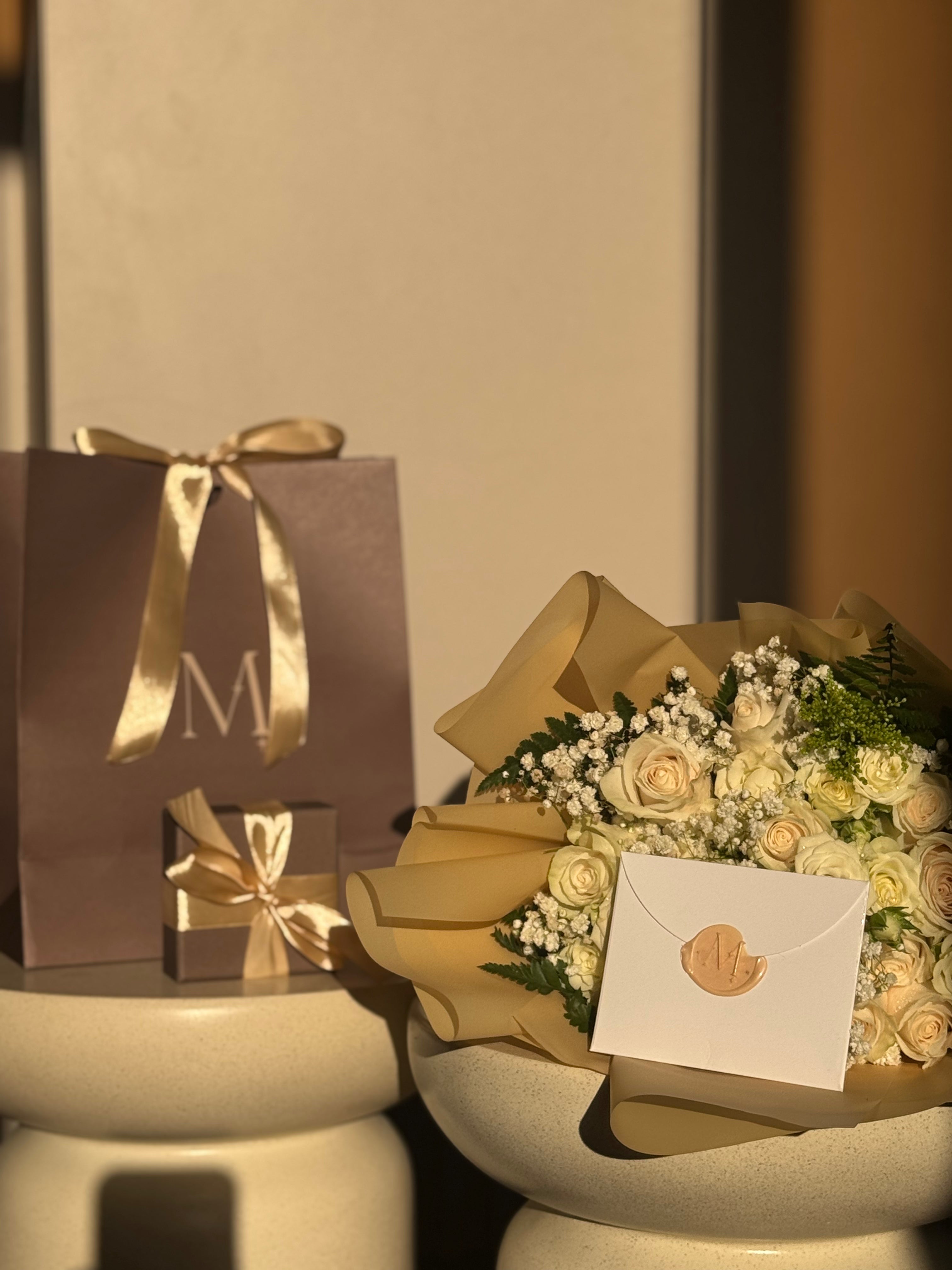 Gift wrapping and Elegant White Rose Bouquet